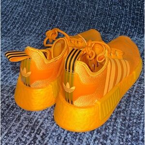 orange addidas nmd